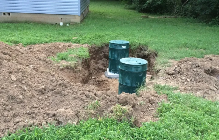 FusionSite technician pumping a septic tank at a Middle Tennessee home