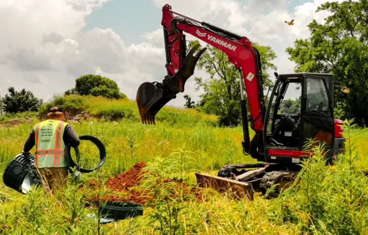 Septic tank riser installed at grade for easier access on a Nashville property